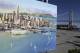 An artists sketch showing the Golden State Warriors proposed new basketball arena is displayed with the San Francisco-Oakland Bay Bridge in the background in San Francisco, Tuesday, May 22, 2012. The Warriors unveiled plans to build an arena at Piers 30-32. The waterfront site is just blocks from the San Francisco Giants' ballpark and the downtown financial district. The arena is expected to be completed by 2017. (AP Photo/Eric Risberg)