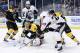 Boston Bruins goalie Tuukka Rask (40) blocks a shot by Pittsburgh Penguins' Chris Conner (23) in the first period of an NHL hockey game in Boston, Saturday, Dec. 7, 2013. (AP Photo/Michael Dwyer)