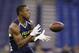 Penn State wide receiver Allen Robinson makes a catch during a drill at the NFL football scouting combine in Indianapolis, Sunday, Feb. 23, 2014. (AP Photo/Michael Conroy)