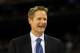HOUSTON, TX - APRIL 04: Broadcaster Steve Kerr smiles on the court before the National Championship Game of the 2011 NCAA Division I Men's Basketball Tournament between the Butler Bulldogs and Connecticut Huskies at Reliant Stadium on April 4, 2011 in Houston, Texas. (Photo by Streeter Lecka/Getty Images)
