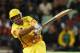 Chennai Super Kings captain MS Dhoni is his by delivery from Royal Challengers Bangalore's bowler Dillon du Preez, unseen, during the 1st semi-final of the Champions League Twenty20 cricket match at the Kingsmead stadium in Durban, South Africa on Friday Sept. 24, 2010. (AP Photo/Themba Hadebe)