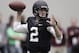 Texas A&M quarterback Johnny Manziel passes the ball during a drill at pro day for NFL football representatives in College Station, Texas, Thursday, March 27, 2014. (AP Photo/Patric Schneider)