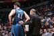 MINNEAPOLIS, MN - April 2: Kevin Love #42 and head coach Rick Adelman of the Minnesota Timberwolves stand on the sideline during a game against the Memphis Grizzlies on April 2, 2014 at Target Center in Minneapolis, Minnesota. NOTE TO USER: User expressly acknowledges and agrees that, by downloading and or using this Photograph, user is consenting to the terms and conditions of the Getty Images License Agreement. Mandatory Copyright Notice: Copyright 2014 NBAE (Photo by David Sherman/NBAE via Getty Images)