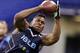 Buffalo linebacker Khalil Mack makes a catch as he runs a drill at the NFL football scouting combine in Indianapolis, Monday, Feb. 24, 2014. (AP Photo/Michael Conroy)