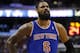 New York Knicks' Tyson Chandler in action during an NBA basketball game against the Philadelphia 76ers, Friday, March 21, 2014, in Philadelphia. (AP Photo/Matt Slocum)