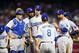Apr 13, 2014; Phoenix, AZ, USA; Los Angeles Dodgers catcher Tim Federowicz (left) looks on as pitcher Dan Haren (center) is pulled from the game by manager Don Mattingly against the Arizona Diamondbacks at Chase Field. Mandatory Credit: Mark J. Rebilas-USA TODAY Sports
