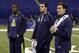 Texas A&M quarterback Johnny Manziel, right, Fresno State quarterback Derek Carr, center, and Louisville quarterback Teddy Bridgewater watch drills at the NFL football scouting combine in Indianapolis, Sunday, Feb. 23, 2014. (AP Photo/Michael Conroy)