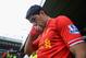 NORWICH, ENGLAND - APRIL 20: Luis Suarez of Liverpool kisses his hand as he walks out during the Barclays Premier League match between Norwich City and Liverpool at Carrow Road on April 20, 2014 in Norwich, England. (Photo by Michael Regan/Getty Images)
