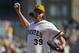 Pittsburgh Pirates relief pitcher Jason Grilli (39) delivers during the ninth inning of a baseball game against the Milwaukee Brewers in Pittsburgh Sunday, April 20, 2014. The Brewers won in 14 innings 3-2. (AP Photo/Gene J. Puskar)
