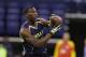 USC wide receiver Marqise Lee makes a catch during a drill at the NFL football scouting combine in Indianapolis, Sunday, Feb. 23, 2014. (AP Photo/Michael Conroy)