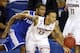 Connecticut guard Shabazz Napier (13) tries to control the ball as Kentucky guard Aaron Harrison (2) defends during the second half of the NCAA Final Four tournament college basketball championship game Monday, April 7, 2014, in Arlington, Texas. (AP Photo/Tony Gutierrez)