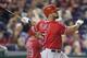 Los Angeles Angels Albert Pujols watches the ball after connecting for a two-run homer against Washington Nationals Taylor Jordan in the fifth inning of a baseball game in Washington, Tuesday, April 22, 2014. This was Pujols 500th career home run. (AP Photo/Pablo Martinez Monsivais)