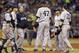 New York Yankees starting pitcher Ivan Nova is visited on the mound by infielders and manager Joe Girardi during the fifth inning of a baseball game against the Tampa Bay Rays Saturday, April 19, 2014, in St. Petersburg, Fla. (AP Photo/Mike Carlson)