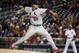 St. Louis Cardinals starting pitcher Adam Wainwright throws during a baseball game against the Washington Nationals at Nationals Park Thursday, April 17, 2014, in Washington. (AP Photo/Alex Brandon)