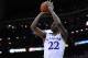 eMar 13, 2014; Kansas City, MO, USA; Kansas Jayhawks guard Andrew Wiggins (22) shoots a jumpshot during the second half against the Oklahoma State Cowboys in the second round of the Big 12 Conference college basketball tournament at Sprint Center. Kansas won 77-70 in overtime. Mandatory Credit: Denny Medley-USA TODAY Sports