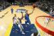 Dallas Mavericks forward Dirk Nowitzki (41), of Germany, cries out after scoring against the Memphis Grizzlies in the second half of an NBA basketball game Wednesday, April 16, 2014, in Memphis, Tenn. The Grizzlies won in overtime 106-105. (AP Photo/Lance Murphey)