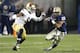 Pittsburgh wide receiver Tyler Boyd (23) runs the ball past Notre Dame linebacker Jaylon Smith (9) in the first quarter of an NCAA college football game Saturday, Nov. 9, 2013, in Pittsburgh. (AP Photo/Keith Srakocic)