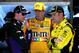 MARTINSVILLE, VA - MARCH 28: (L-R) Denny Hamlin, driver of the #11 FedEx Freight Toyota, Kyle Busch, driver of the #18 M&M's Toyota, and Matt Kenseth, driver of the #20 Dollar General Toyota, talk in the garage area during practice for the NASCAR Sprint Cup Series STP 500 at Martinsville Speedway on March 28, 2014 in Martinsville, Virginia. (Photo by Jeff Curry/Getty Images)