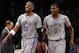 Brooklyn Nets' Paul Pierce (34) and Joe Johnson (7) react during the second half of an NBA basketball game against the Atlanta Hawks Friday, April 11, 2014, in New York. Atlanta won 93-88. (AP Photo/Jason DeCrow)