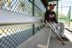 Atlanta Braves catcher Christian Bethancourt sits on a bench during a spring training baseball workout, Tuesday, Feb. 18, 2014, in Kissimmee, Fla. (AP Photo/Alex Brandon)