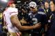 SEATTLE, WA - JANUARY 19: Quarterback Colin Kaepernick #7 of the San Francisco 49ers shakes hands with quarterback Russell Wilson #3 of the Seattle Seahawks after the Seahawks defeated the 49ers 23-17 during the 2014 NFC Championship at CenturyLink Field on January 19, 2014 in Seattle, Washington. (Photo by Christian Petersen/Getty Images)