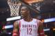 Apr 20, 2014; Houston, TX, USA; Houston Rockets center Dwight Howard (12) reacts after a call during the second quarter against the Portland Trail Blazers in game one during the first round of the 2014 NBA Playoffs at Toyota Center. Mandatory Credit: Troy Taormina-USA TODAY Sports