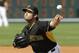 Baltimore Orioles pitcher Daniel Schlereth throws during the ninth inning of a spring exhibition baseball game against the Pittsburgh Pirates in Bradenton, Fla., Monday, March 10, 2014. (AP Photo/Carlos Osorio)