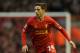 LIVERPOOL, ENGLAND - DECEMBER 07: Joe Allen of Liverpool in action during the Barclays Premier League match between Liverpool and West Ham United at Anfield on December 7, 2013 in Liverpool, England. (Photo by Clive Brunskill/Getty Images)