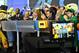 Atlantic Coast Conference mascots join ACC and NASDAQ officials for the ringing of the closing bell on Monday, July 1, 2013 in New York. The Atlantic Coast Conference officials and coaches visited the NASDAQ Market Site in Times Square to officially announce the addition of its three new members in Notre Dame, Pitt and Syracuse. (AP Photo/Bethan McKernan)