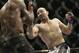 Glover Teixeira, right, fights Quinton Jackson during UFC Light Heavyweight Championship on FOX 6 at the United Center in Chicago, Saturday, Jan. 26, 2013. Teixeira won the bout. (AP Photo/Nam Y. Huh)