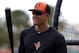 Baltimore Orioles' Manny Machado waits his turn in the batting cage before and an exhibition spring training baseball game against the Philadelphia Phillies in Sarasota, Fla., Friday, March 7, 2014. (AP Photo/Gene J. Puskar)