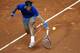 Rafael Nadal of Spain returns the ball to Ivan Dodig from Croatia, during the Barcelona open tennis in Barcelona, Spain, Thursday, April 24, 2014. (AP Photo/Manu Fernandez)