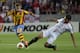 Sevilla's Nico Pareja, right, and Valencia's Fede Cartabia from Argentina, left, fight for the ball during their Europa League semifinal first leg soccer match at the Ramon Sanchez Pizjuan stadium, in Seville, Spain on Thursday, April 24, 2014. (AP Photo/Miguel Angel Morenatti)