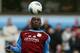 Tottenham Hotspur's William Gallas, right, vies for the ball against Aston Villa's Emile Heskey during their English Premier League soccer match at Villa Park, Birmingham, England, Sunday May 6, 2012. (AP Photo/Tim Hales)