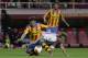 Sevilla's Ivan Rakitic, right, and Valencia's Pablo Piatti, left, fight for the ball during their Europa League semifinal first leg soccer match at the Ramon Sanchez Pizjuan stadium, in Seville, Spain on Thursday, April 24, 2014. (AP Photo/Miguel Angel Morenatti)