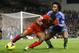 Chelsea's Willian, right, vies for the ball with Liverpool's Raheem Sterling during the English Premier League soccer match between Chelsea and Liverpool at Stamford Bridge Stadium in London, Sunday, Dec. 29, 2013. (AP Photo/Kirsty Wigglesworth)