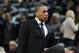 Toronto Raptors team ambassador Jamaal Magloire looks on from the bench before the Raptors face the Denver Nuggets in the first quarter of an NBA basketball game in Denver on Friday, Jan. 31, 2014. (AP Photo/David Zalubowski)