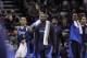 Dallas Mavericks' Monta Ellis (11) and DeJuan Blair, center, celebrate with teammates during the second half of Game 2 of the opening-round NBA basketball playoff series against the San Antonio Spurs, Wednesday, April 23, 2014, in San Antonio. Dallas won 113-92. (AP Photo/Eric Gay)