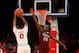 Dec 7, 2013; New York, NY, USA; St. John's Red Storm guard Jamal Branch (0) shoots over Fordham Rams guard Bryan Smith (24) during the first half at Madison Square Garden. Mandatory Credit: Anthony Gruppuso-USA TODAY Sports