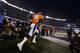 Denver Broncos quarterback Peyton Manning runs onto the field before the NFL Super Bowl XLVIII football game against the Seattle Seahawks at MetLife Stadium Sunday, Feb. 2, 2014, in East Rutherford, N.J. The Seahawks won 43-8. (AP Photo/Paul Sancya)