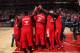 The Chicago Bulls huddle up before tip-off.