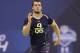 Fresno State quarterback Derek Carr runs a drill at the NFL football scouting combine in Indianapolis, Sunday, Feb. 23, 2014. (AP Photo/Nam Y. Huh)