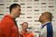 Boxing champion Wladimir Klitschko of Ukraine, left, stares at challenger Alex Leapai from Australia-Samoa during a press conference ahead of their IBF, IBO, WBO and WBA heavyweight title bout in Duesseldorf, Germany, Tuesday, April 22, 2014. (AP Photo/Martin Meissner)