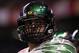 Dec 30, 2013; San Antonio, TX, USA; Oregon Ducks offensive lineman Hroniss Grasu (55) warms up before the game against the Texas Longhorns during the first half at Alamo Dome. Mandatory Credit: Soobum Im-USA TODAY Sports