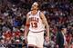 Chicago Bulls center Joakim Noah (13) celebrates the Bulls' expanding lead on the Indiana Pacers during the second half of an NBA basketball game Monday, March 24, 2014, in Chicago. The Bulls won 89-77. (AP Photo/Charles Rex Arbogast)