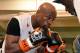 LAS VEGAS, NV - APRIL 22: Boxer Floyd Mayweather Jr. works out with his trainer and uncle Roger Mayweather at the Mayweather Boxing Club on April 22, 2014 in Las Vegas, Nevada. Mayweather will face Marcos Maidana in a 12-round world championship unification bout in Las Vegas on May 3. (Photo by Ethan Miller/Getty Images)