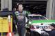 Kyle Busch leaves the garage heading to his trailer after a practice session for the NASCAR Sprint Cup Series auto race at Texas Motor Speedway in Fort Worth, Texas, Saturday, April 5, 2014. (AP Photo/LM Otero)