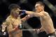 Max Holloway (right)