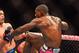 Aug 3, 2013; Rio De Janeiro, Brazil; Phil Davis (pink shorts) fights against Lyoto Machida (blue shorts) during UFC 163 at HSBC Arena. Mandatory Credit: Jason Silva-USA TODAY Sports
