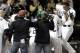 Chicago White Sox's Jose Abreu, right, celebrates with teammates after hitting a grand slam against theTampa Bay Rays during the ninth inning of a baseball game in Chicago on Friday, April 25, 2014. The White Sox won 9-6. (AP Photo/Nam Y. Huh)